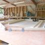 Préparation de murs en bois intérieur pour une surélévation